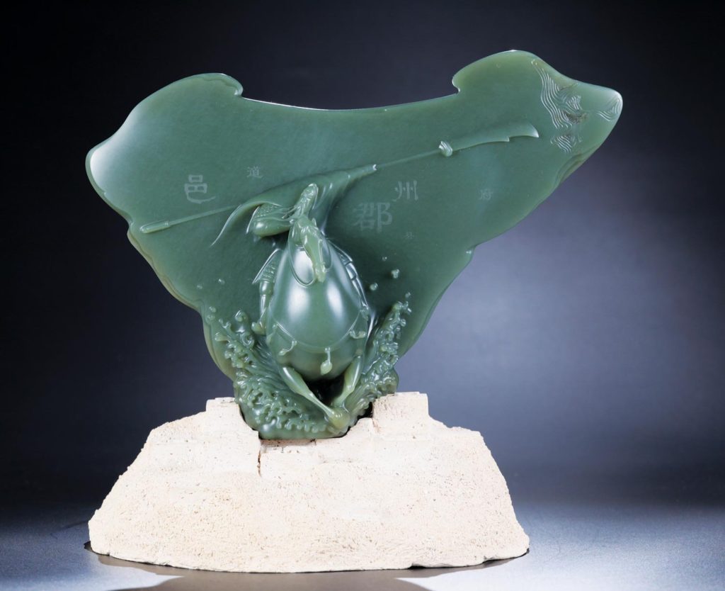 Carving in green jade by Master 张庆东 [Zhang Qingdong]. Carvings with such intricate detail are only possible with modern tools and techniques.