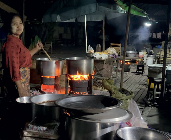 Breakfast cooking just outside the early morning rough market at the Mandalay Jade Market. (Photo: Andrew Lucas. ©Guild Gemology Education)