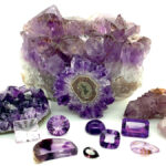 Different types of amethyst, from 'Rose de France' to lavender to reddish, in rough form and in various cuts and sizes.
