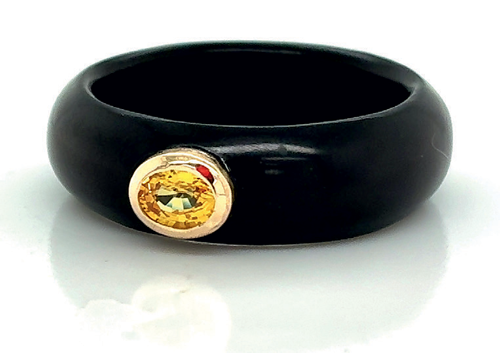 Black jade ring and yellow sapphire, both cut by Émilie.