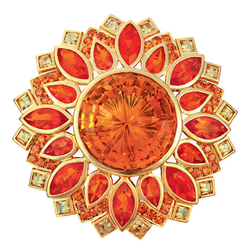 'Eternal Sunshine' brooch features a John Dyer faceted 32-ct 'Starbrite' citrine from Rio Grande del Sur. The rays are custom-cut fire opal with an orange and yellow sapphire corona.