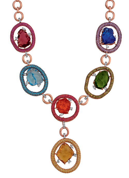Necklace with rough and faceted colored gemstones. 