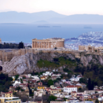 View of the Acropolis of Athens from Mt Lycabettus as well as the Saronic Gulf; in the distance, the Peloponnese. (Photo: George E. Koronaios, Wikimedia Commons, CC BY-SA 4.0.