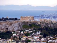 The International Gemmological Conference (IGC) View of the Acropolis of Athens from Mt Lycabettus as well as the Saronic Gulf; in the distance, the Peloponnese. (Photo: George E. Koronaios, Wikimedia Commons, CC BY-SA 4.0.